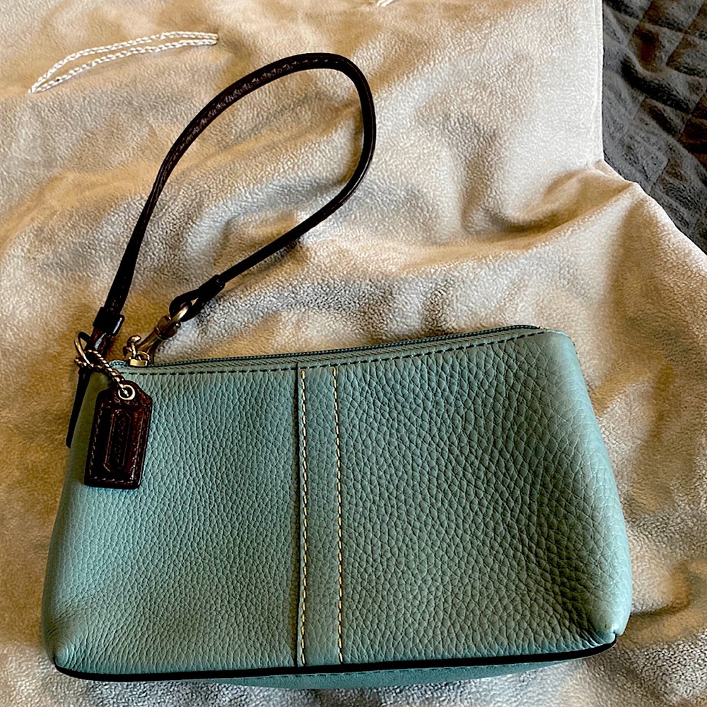Coach Wristlet Soft Pebble Collection, Dusty blue, brown leather strap. & 7.5x4”